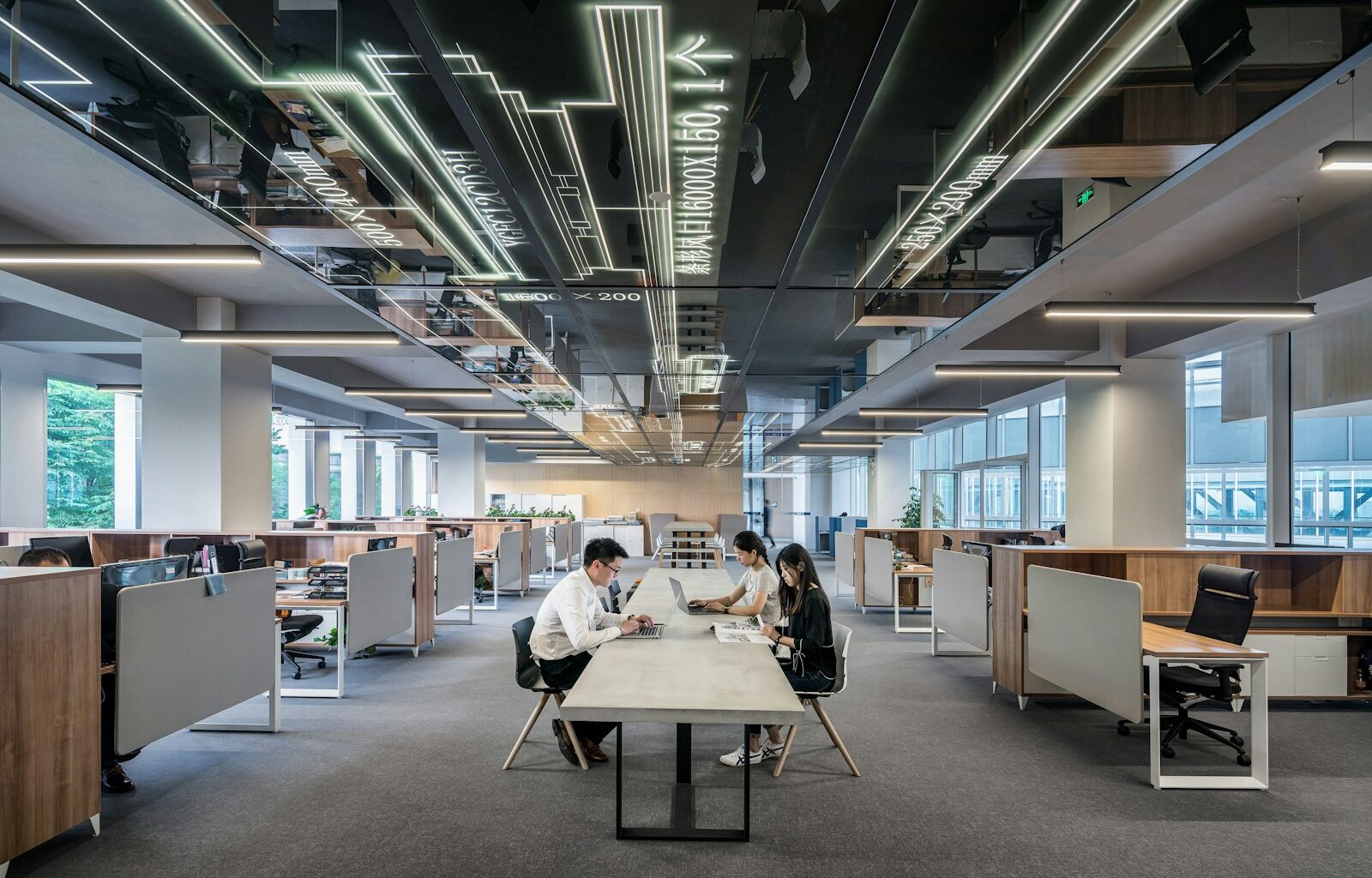 man and woman sitting on table